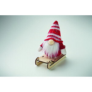 Gnome on wooden sleigh