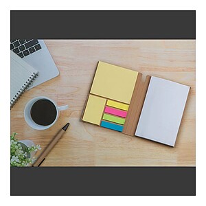 Notebook with pen and sticky notes