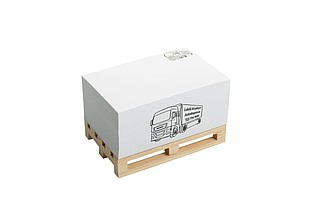 Paper cube on a wooden palette