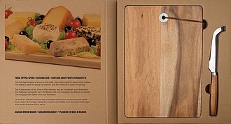 Wooden board with cheese knife