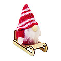 Gnome on wooden sleigh