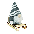 Gnome on wooden sleigh