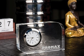 Glass block with small clock, transparent