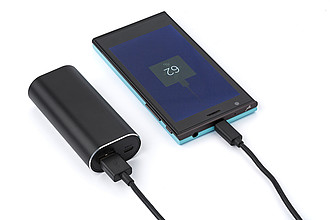 Power bank with two wireless earbuds. The Li-ion battery has a 4000 mAh capacity.