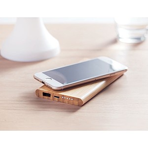Wireless charging and power bank with 6000 mAh capacity in Bamboo casing. Includes Type C connector.